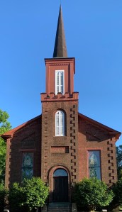 Picture of First Presbyterian Church of Greensboro, Alabama, from Main Street.